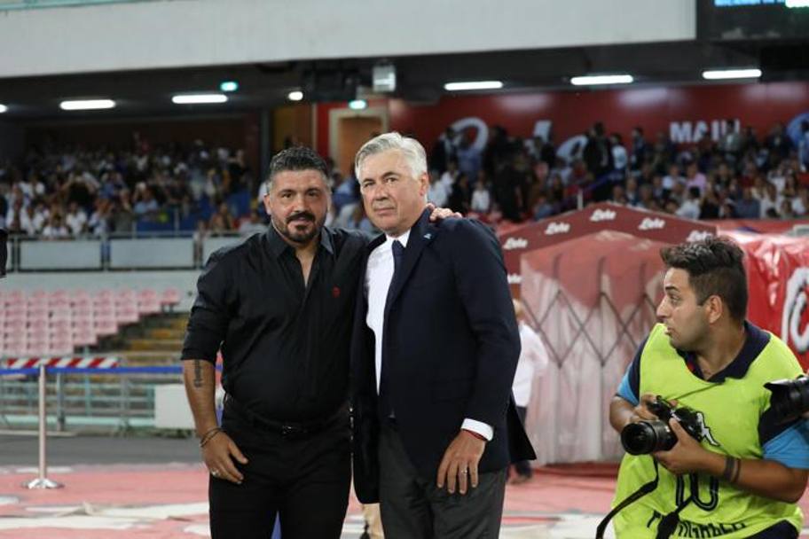 Gattuso e Ancelotti posano davanti ai fotografi. Ansa